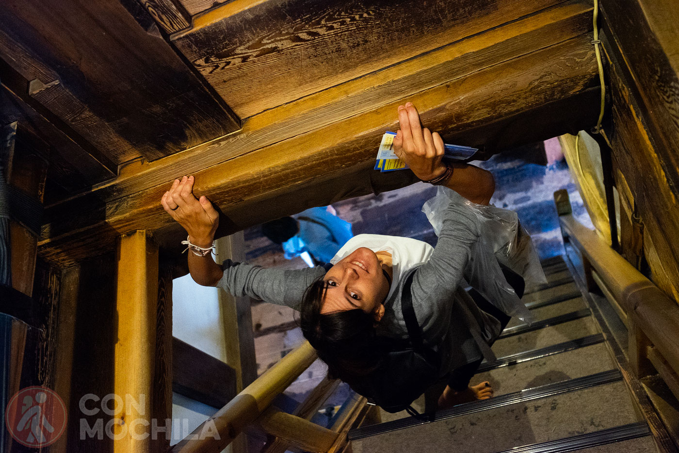 Maneuvering to get down this staircase