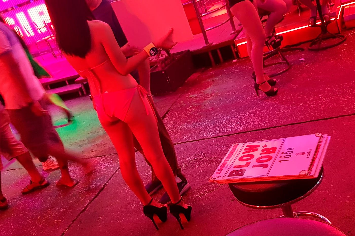 A 'go-go bar' on Soi Cowboy that advertises cocktails with suggestive names