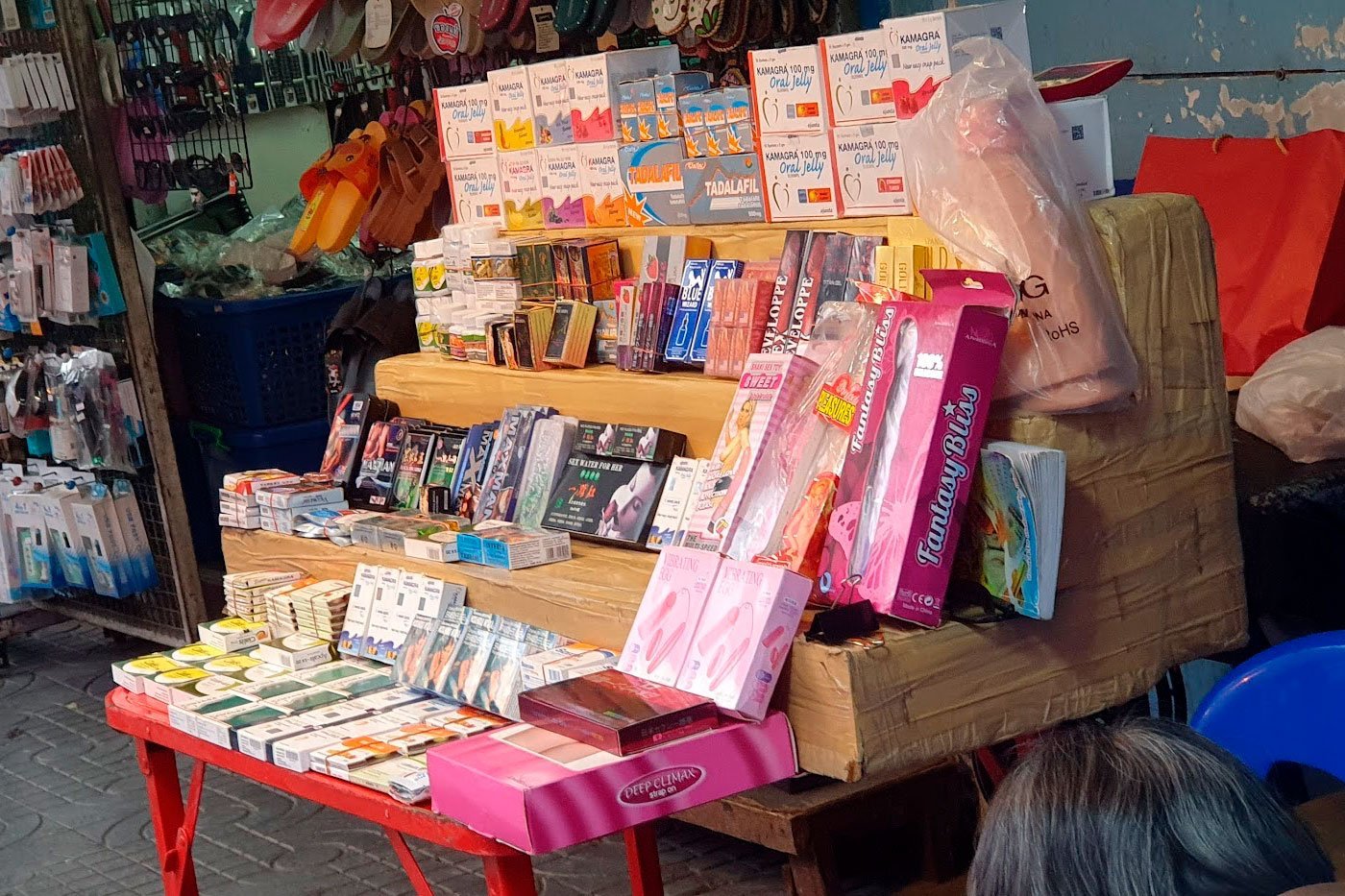 A street stall selling Indian Viagra and vibrators, both illegal in Thailand.