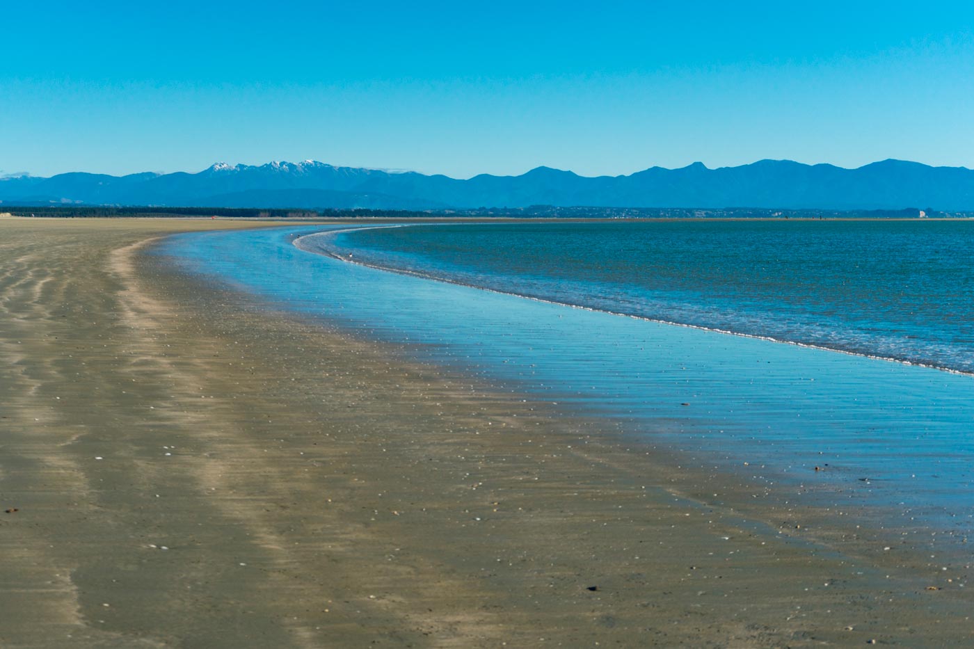 It's almost two kilometers of beach will invite you to swim