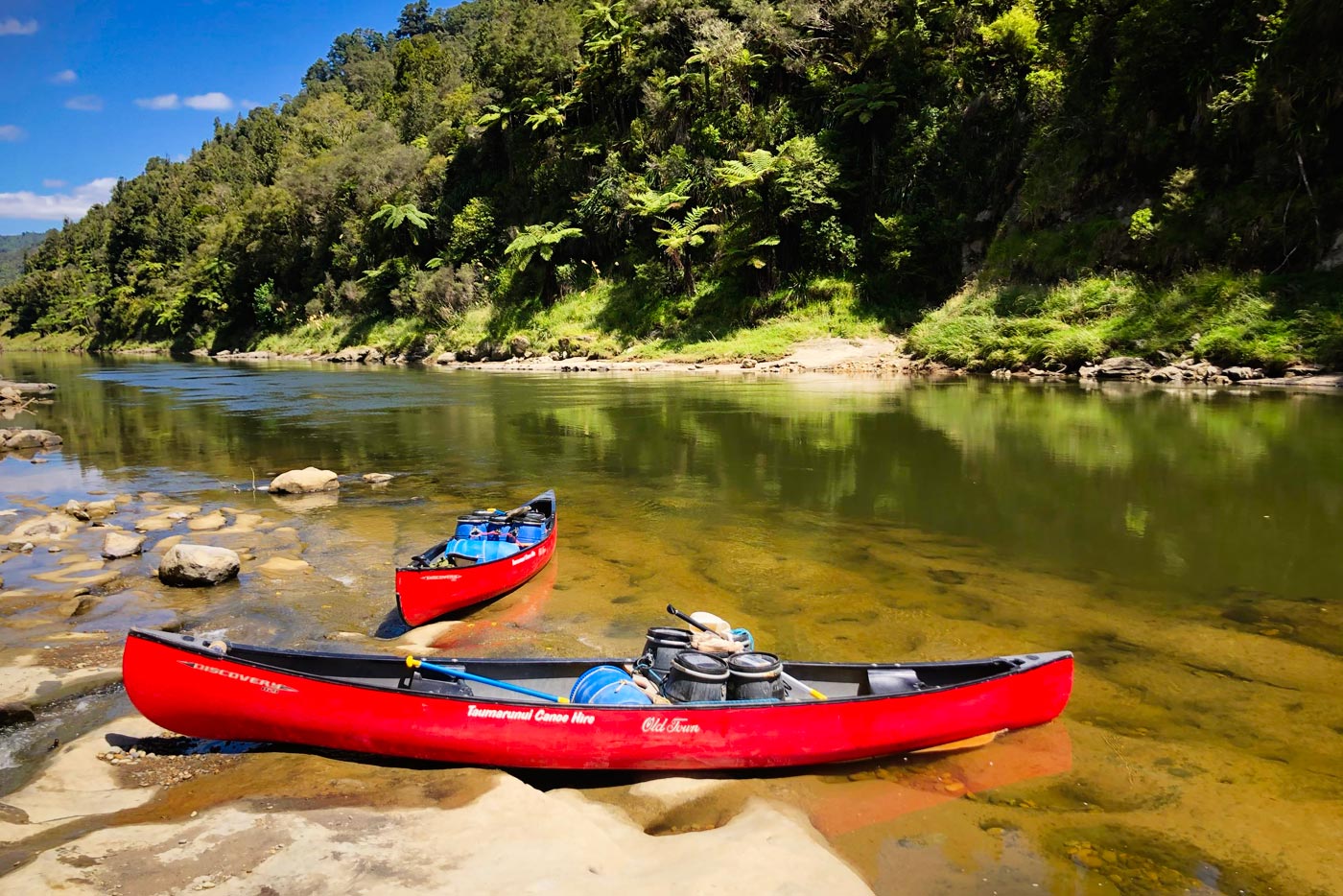 Barrels, paddles, canoe…