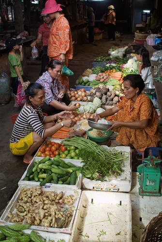 Mujeres con las hortalizas y verduras
